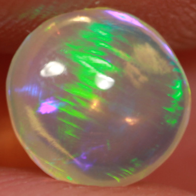 SOLID CRYSTAL OPAL Linear Rolling flashes of green fire